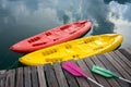 Colorful canoes docked on a lake