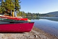 Colorful Canoes on Lake Shore