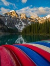 Colorful canoes at Moraine Lake, Banff National Park at sunrise Royalty Free Stock Photo