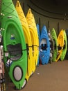 Colorful canoes for sale at store