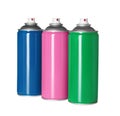 Colorful cans of spray paints on white background Royalty Free Stock Photo