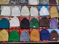 Colorful Caps on retail display during Ramadan.
