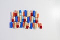 Colorful capsule pills on isolated white background with copy space. Antibiotic drug resistance. Pharmaceutical industry Royalty Free Stock Photo