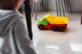 colorful car on the floow and child