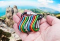 Colorful carabiner climbing in hand