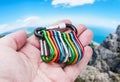 Colorful carabiner climbing in hand