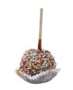 Colorful caramel apple on white background