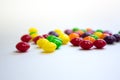 Colorful caramel candy on white background