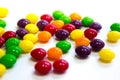 Colorful caramel candy on white background