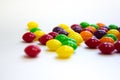 Colorful caramel candy on white background