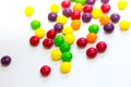 Colorful caramel candy on white background