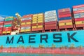 Colorful cargo shipping containers stacked aboard of container ship Maersk Line Royalty Free Stock Photo