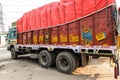 Colorful cargo truck with rich decorative paintings, typical for the trucks in India