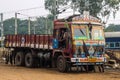 Colorful cargo truck with rich decorative paintings, typical for the trucks in India.