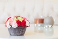 Colorful carnations in brown vase. Royalty Free Stock Photo