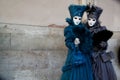 Colorful carnival blue-black mask and costume at the traditional festival in Venice, Italy