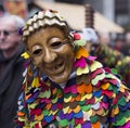 Colorful carnival costume and wooden mask