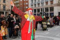 Colorful carnival parade down the street with clowns in Zamora, Spain.