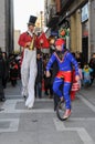 Colorful carnival parade down the street in February with clowns and jugglers in Zamora. Spain.