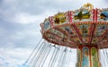 Carousel on cloudy sky background. Oktoberfest, Bavaria, Germany Royalty Free Stock Photo