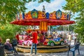 A colorful carousel merry go round at the resort city of Warnemunde Rostock Germany