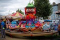 Colorful carousel with toy vehicles as seats in fun fair park in Bray, Ireland