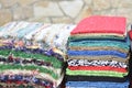 Colorful carpets and fabrics in market ideal for background Royalty Free Stock Photo