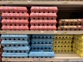 Colorful Cartons of Eggs in a Refrigerated Grocery Case