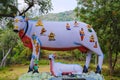 Colorful carved idols of many gods and goddesses on cow`s back, on the way to Kanchipuram, Tamil Nadu, India