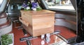 Colorful casket in a hearse or chapel before funeral or burial at cemetery