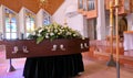 A colorful casket in a hearse or chapel before funeral or burial at cemetery