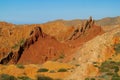 Colorful castle shape mountains, yellow and different color painted hills Royalty Free Stock Photo