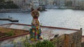 Colorful cat statue in the Independence Garden, Exiles bay, Malta