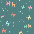 Colorful cats and traces silhouette seamless pattern. Royalty Free Stock Photo