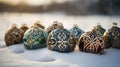 Colorful Celtic Christmas baubles on snow on a cloudy day