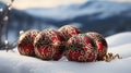 Colorful Celtic Christmas baubles on snow on a sunny day