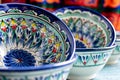 Colorful ceramic tableware with oriental ornaments close-up Royalty Free Stock Photo