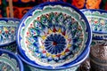 Colorful ceramic tableware with oriental ornaments close-up Royalty Free Stock Photo
