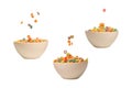 Colorful cereal box for morning breakfast. Corn flakes falling to the white bowl. Motion Royalty Free Stock Photo