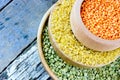 Colorful cereals - red lentils, yellow bulgur and green peas Royalty Free Stock Photo