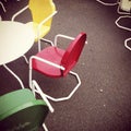 Colorful chairs in a garden