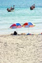 Colorful chairs and umbrella on beach Royalty Free Stock Photo