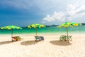 Colorful chairs and umbrella on tropical beach at Koh Khai Nok I Royalty Free Stock Photo