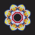 Colorful chakra ornament in tibetian-color style on dark background.
