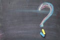 Colorful chalk question mark on blackboard background Royalty Free Stock Photo