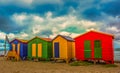 St James beach Cape Town - colorful changing rooms with beautiful sunset and cloud formation