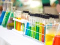 Colorful chemical substance in the clear test tube and flask