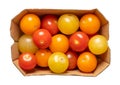 Colorful cherry tomatoes, ready to eat cocktail tomatoes, in cardboard punnet Royalty Free Stock Photo