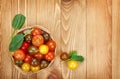 Colorful cherry tomatoes on wooden table