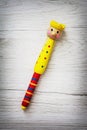 Colorful childish funny pen on the wooden texture